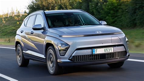 „Hyundai Kona Electric“ interjero nuotrauka su 230V lizdu