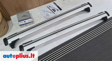 Ford Galaxy su stogo skersiniais ir bagažine