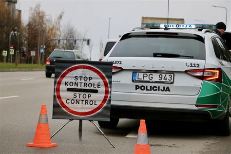 simbolis rodantis baudą už kelių eismo taisyklių pažeidimą