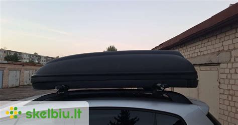 Volkswagen Passat su stogo skersiniais ir bagažine