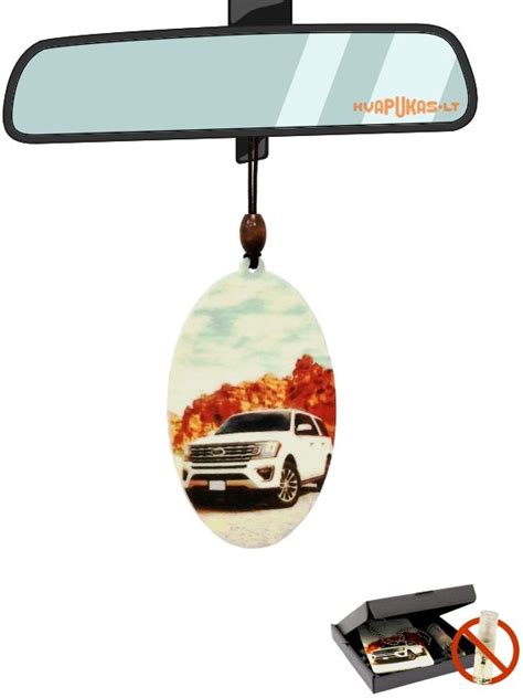 Nuotrauka, vaizduojanti automobilio raktą su lustu viduje