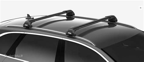 Thule WingBar Edge stogo skersiniai ant BMW F11