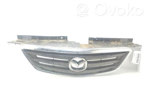 Mazda Premacy automobilio priekinės dalies vaizdas su guminiu kilimėliu