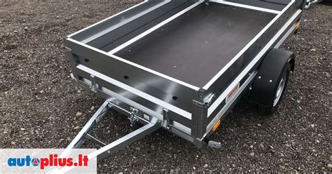 Schematinis priekabos rėmo vaizdas su apkrovomis