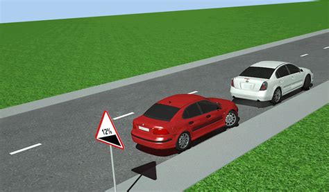 Automobilio priekiniai ratai pasukti į šoną statant įkalnėje
