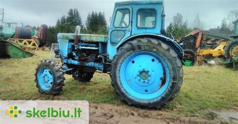 Nuotrauka su traktoriaus T40 AM sankabos detalėmis