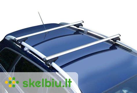 Schema, kaip tvirtinami stogo skersiniai prie automobilio