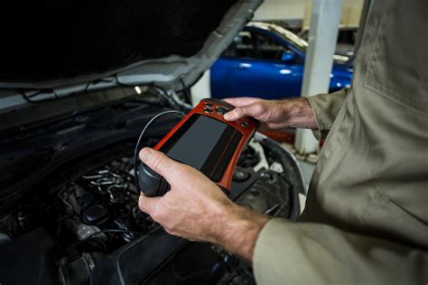 Nuotrauka, vaizduojanti automobilių diagnostikos įrangą