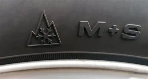 Žieminių padangų žymėjimo simboliai: M+S ir kalno su snaige simbolis