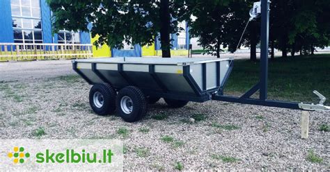 Caselli bortinė priekaba traktoriui su kroviniu