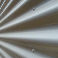 Profiliuotos skardos priekabos dengimo procesas