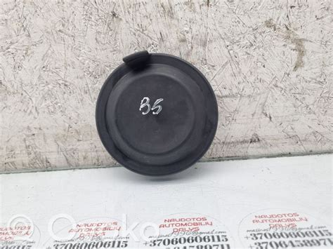 Priekinio žibinto purkštuko dangtelis automobilyje