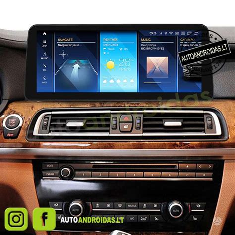 BMW E61 automobilio interjeras su navigacijos ekranu
