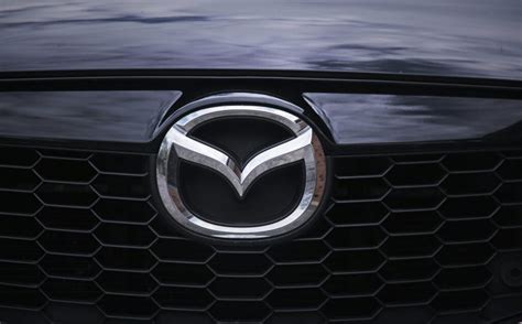 Mazda logotipas ir automobilių dalys