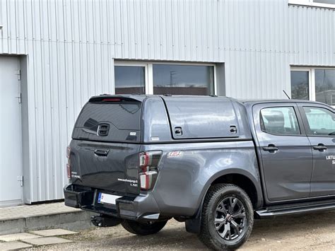 Citroen Nemo su atidarytomis galinėmis durimis ir kroviniu