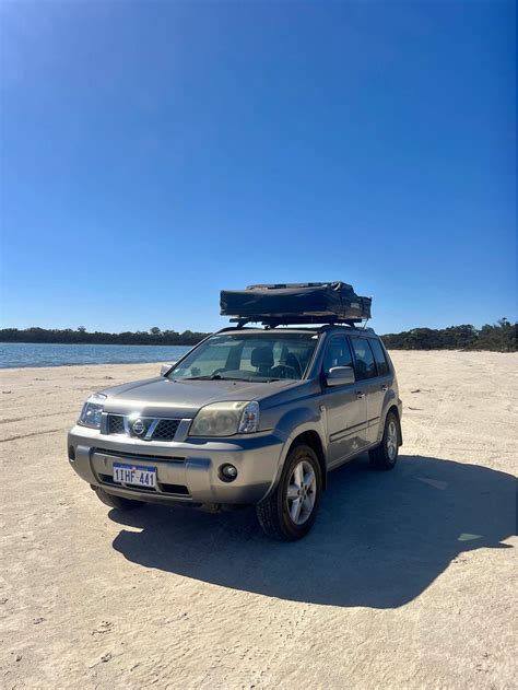 Nissan X-Trail 2004 saugiklių dėžės išdėstymas