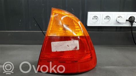 BMW E46 galinių žibintų schematinis vaizdas su funkcijų paaiškinimu