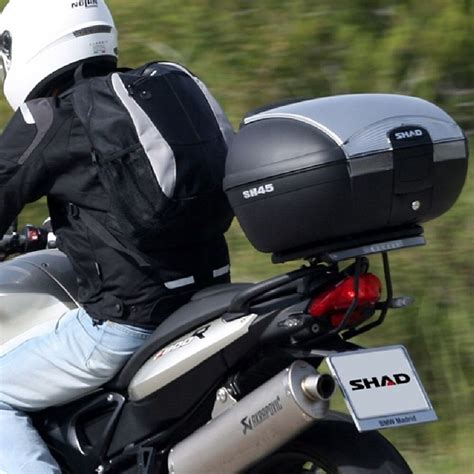 Motociklo bagažinės montavimas