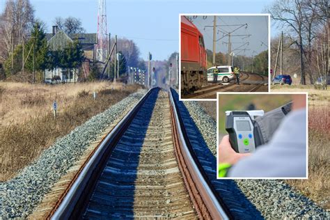 Nuvirtęs kranas ant geležinkelio bėgių