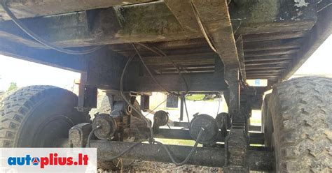 Traktorinės priekabos išvertimo mechanizmas