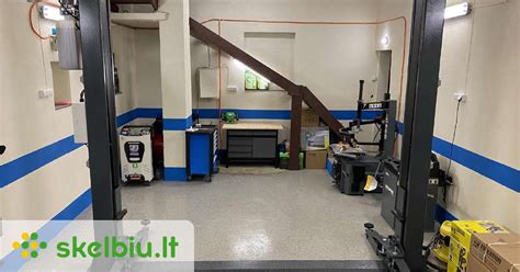 Serviso patalpos su ratų suvedimo įranga