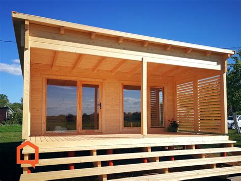 Medinio namelio projektas su panoraminiais langais