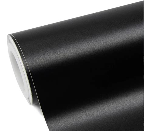 juoda blizgi plėvelė ant automobilio detalių