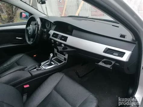 BMW E60 LCI interjeras su pavarų svirtimi