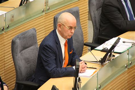 Džonas Ridas raitas ant žirgo Meksikos revoliucijoje