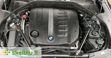 BMW variklis su mėlynais dūmais
