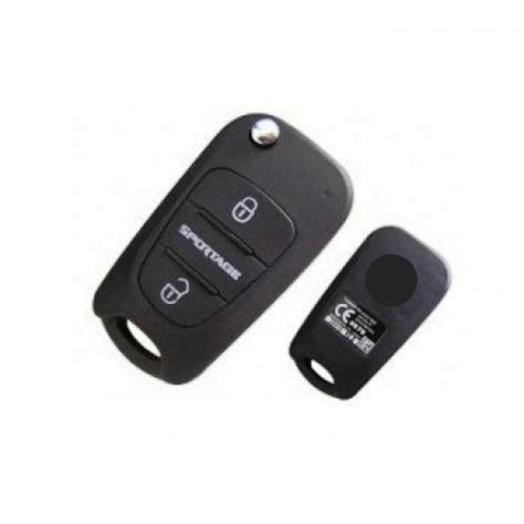 Nuotrauka, vaizduojanti raktelį su mygtukais automobilio atrakinimui ir langų valdymui.