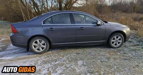 Volvo S80 priekinių žibintų plovimo sistema