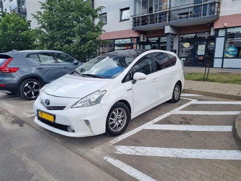 Toyota Prius taksi automobilyje