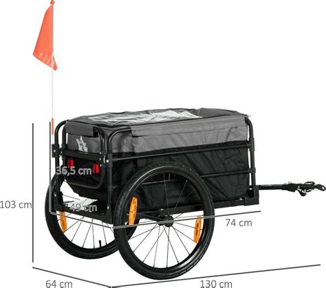 vaikas ir tėvai su dviračių priekaba