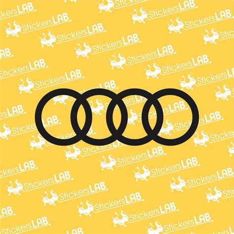 Istorinis Audi logotipas su keturiais žiedais