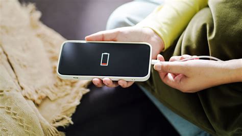 Nuotrauka, vaizduojanti išsipūtusią telefono bateriją