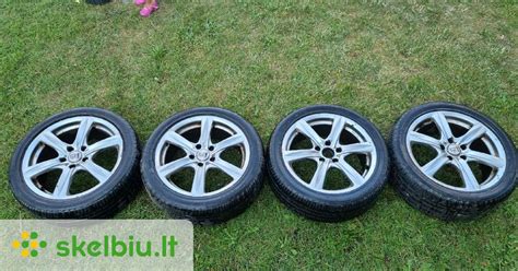 Nuotrauka su įvairiais Mercedes-Benz ratlankiais