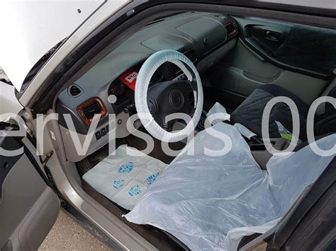 Automobilio salonas su kilimėliais