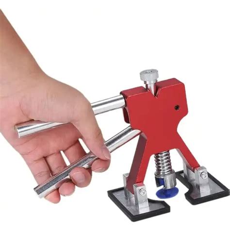 rankinis įdubimų ištraukiklis automobilyje