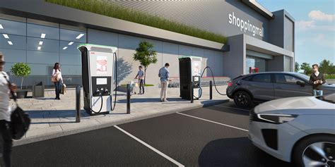 Nuotrauka, vaizduojanti modernią elektromobilių įkrovimo stotelę
