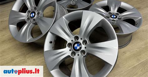 BMW E39 su skirtingų dydžių ratlankiais