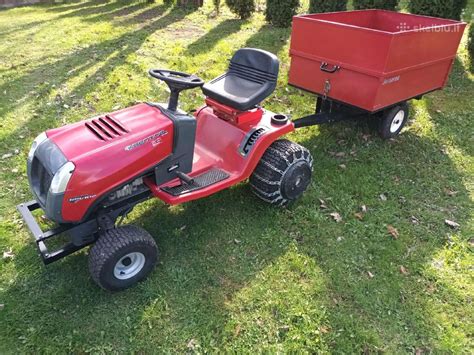 Sodo traktoriukas su pagaminta priekaba