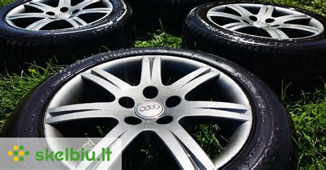 Nuotrauka Audi A2 su skirtingais ratlankiais