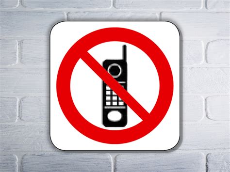 Simbolis, rodantis draudimą naudoti mobilųjį telefoną vairuojant