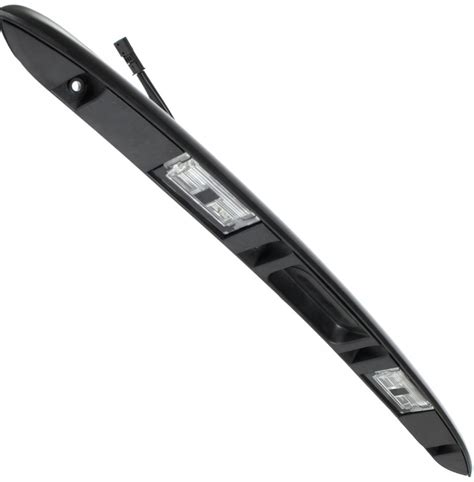 Schematinis BMW X5 E53 bagažinės dangčio apdailos elementas su numerio apšvietimo žibintais