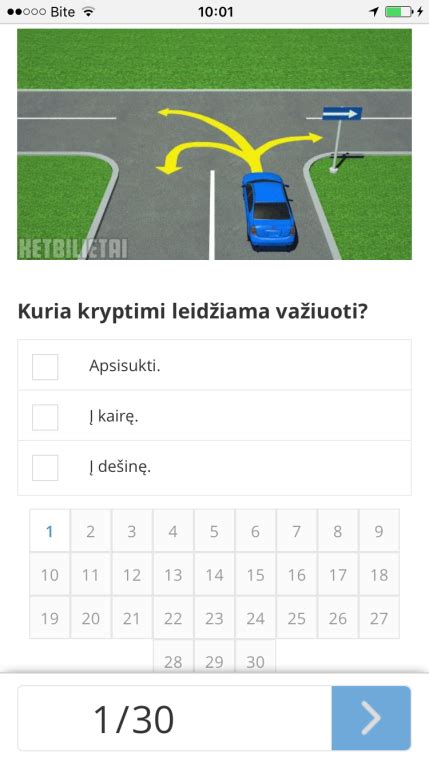 Asmuo sprendžia KET testą kompiuteryje