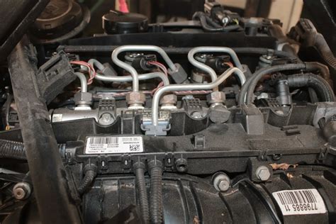 Schematinis BMW E90 variklio vaizdas su pažymėtais davikliais