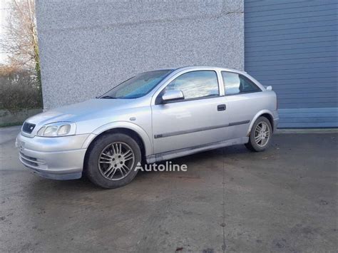 Opel Astra G automobilis su skardiniais ratlankiais