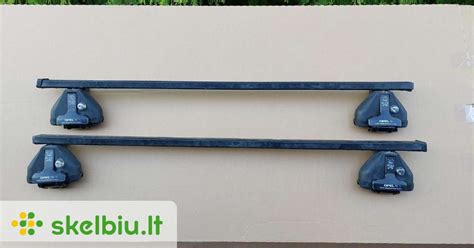 Schematinis stogo bagažinės atidarymo mechanizmas