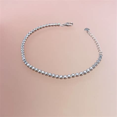 sidabrinė apyrankė su laivo vairo simbolika